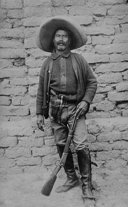 Framed Print : Peon rebel volunteer in the Mexican Revolution, c. 1910-1919. He is armed with a rifle, revolver and knife Framed Print : Peon rebel volunteer in the Mexican Revolution, c. 1910-1919. He is armed with a rifle, revolver and knife