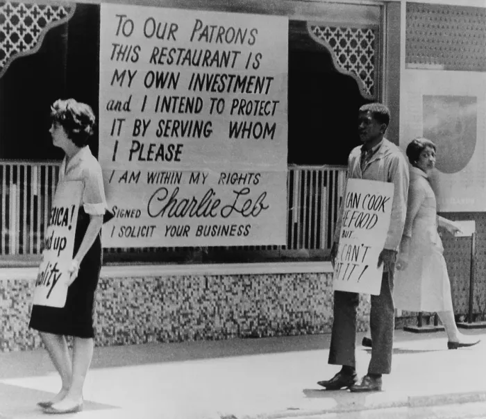Framed Print : People picketing outside an Atlanta restaurant which displays a segregationist sign. 1963 Framed Print : People picketing outside an Atlanta restaurant which displays a segregationist sign. 1963