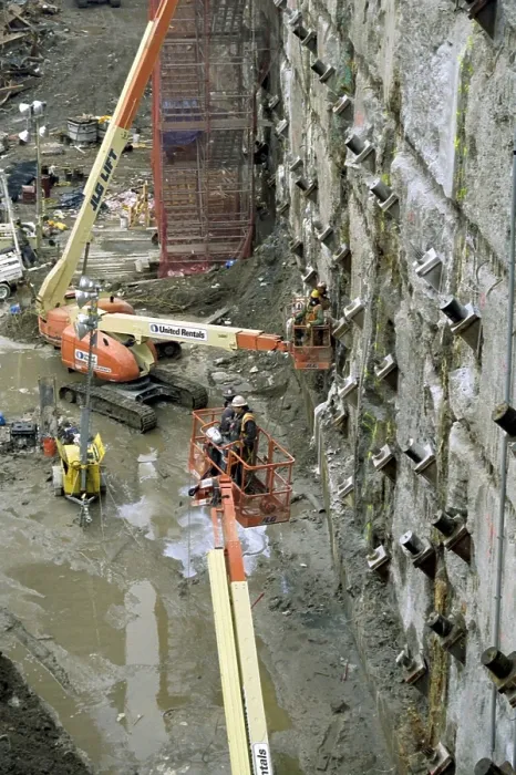 Framed Print : Personnel at Ground Zero tie back and reinforce the exposed slurry wall on March 15, 2002