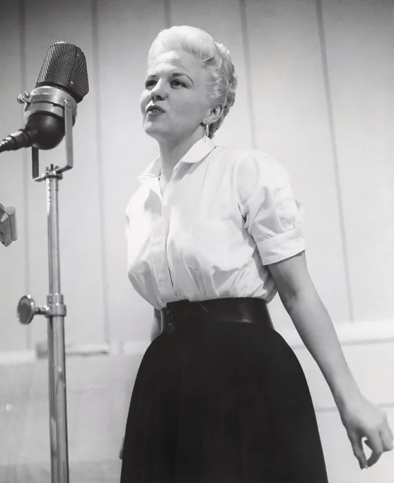 Framed Print : PETE KELLY'S BLUES, Peggy Lee, recording the song Singing a Rainbow for the film soundtrack, 1955. ph: Floyd McCarty / TV Guide / courtesy Everett Collection Framed Print : PETE KELLY'S BLUES, Peggy Lee, recording the song Singing a Rainbow for the film soundtrack, 1955. ph: Floyd McCarty / TV Guide / courtesy Everett Collection