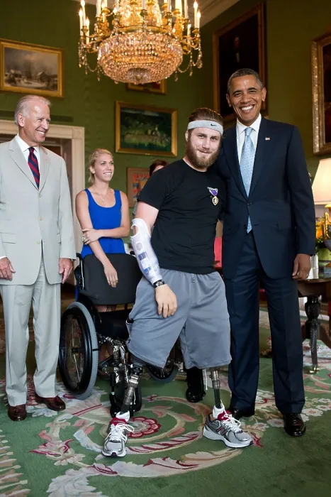 Framed Print : Petty Officer Taylor Morris was presented with a Purple Heart by Pres. Barack Obama. Morris also received a Bronze Star for valorous conduct Framed Print : Petty Officer Taylor Morris was presented with a Purple Heart by Pres. Barack Obama. Morris also received a Bronze Star for valorous conduct