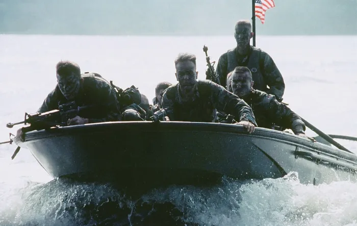 Framed Print : This photograph of six armed US soldiers in a small boat speeding across the water was taken by Corporal Cheresa Clark Framed Print : This photograph of six armed US soldiers in a small boat speeding across the water was taken by Corporal Cheresa Clark