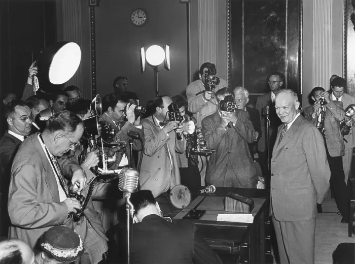 Framed Print : Photographers surround President Eisenhower at a Press Conference on April 30, 1953. Old State Department Building. - (BSLOC_2014_16_66)