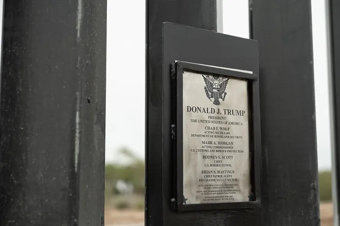 Framed Print : Plaque commemorates the construction of a human barrier wall on the US Mexican Border, Jan. 12, 2021
