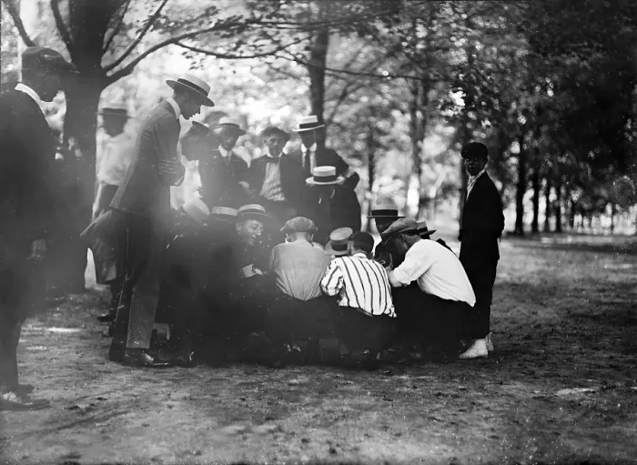Framed Print : Playing a dice game, original title: Crap game, photograph circa 1909-1920 Framed Print : Playing a dice game, original title: Crap game, photograph circa 1909-1920