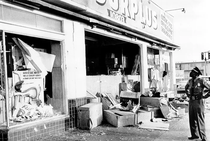 Framed Print : A police officer inspects the damage after the riot in Watts, 1965. Courtesy: CSU Archives / Everett Collection Framed Print : A police officer inspects the damage after the riot in Watts, 1965. Courtesy: CSU Archives / Everett Collection