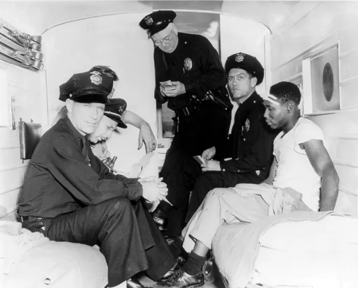 Framed Print : Policemen and wounded African American man inside police ambulance, during the Zoot Suit riot of 1943