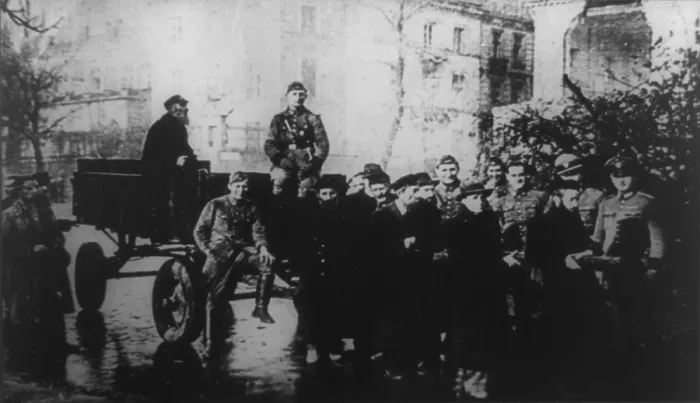 Framed Print : Polish Jews forced to pull a wagon as smiling German soldiers ride or look on. Ca. 1939-43. World War 2. (BSLOC_2014_7_60)