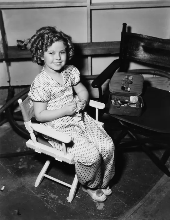 Framed Print : POOR LITTLE RICH GIRL, Shirley Temple, learning to sew on-set, 1936, 20th Century-Fox Film Corporation, TM & Copyright / courtesy Everett Collection Framed Print : POOR LITTLE RICH GIRL, Shirley Temple, learning to sew on-set, 1936, 20th Century-Fox Film Corporation, TM & Copyright / courtesy Everett Collection