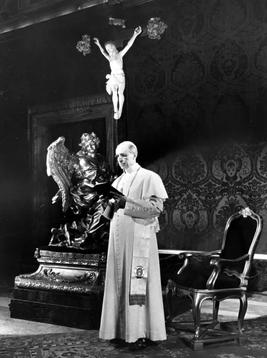 Framed Print : POPE PIUS XII, 1950.Filmed for television reading prayer book for Holy Year Appeal for victims of war.. Courtesy: CSU Archives / Everett Collection Framed Print : POPE PIUS XII, 1950.Filmed for television reading prayer book for Holy Year Appeal for victims of war.. Courtesy: CSU Archives / Everett Collection