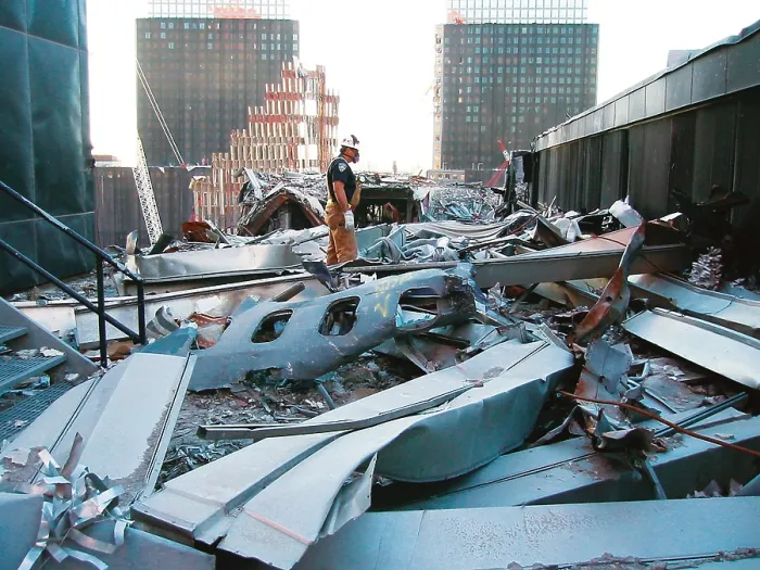 Framed Print : A portion of the fuselage of United Airlines Flight 175 on the roof of WTC 5, Oct. 25, 2001. This was from the plane that crashed into the South Tower, WTC 2