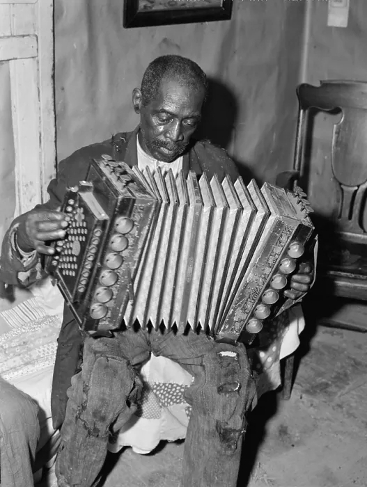 Framed Print : Portrait of an African American man playing an accordion, original caption: John Dyson, Farm Security Administration (aka FSA) borrower, playing the accordion Framed Print : Portrait of an African American man playing an accordion, original caption: John Dyson, Farm Security Administration (aka FSA) borrower, playing the accordion