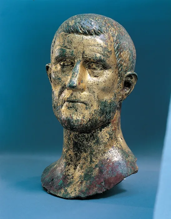 Framed Print : Portrait of Claudius Gothicus, 250 - 299, 3rd Century, golden bronze, h. 50 cm - Italy, Lombardy, Brescia, Santa Giulia Museum. Whole artwork view