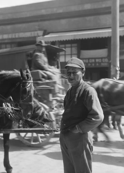 Framed Print : Portrait of middle aged Chinese-American man standing near wagon traffic. Photo by Arnold Genthe, c. 1896-1911, possibly taken in Chinatown, San Francisco (BSLOC_2018_1_48) Framed Print : Portrait of middle aged Chinese-American man standing near wagon traffic. Photo by Arnold Genthe, c. 1896-1911, possibly taken in Chinatown, San Francisco (BSLOC_2018_1_48)