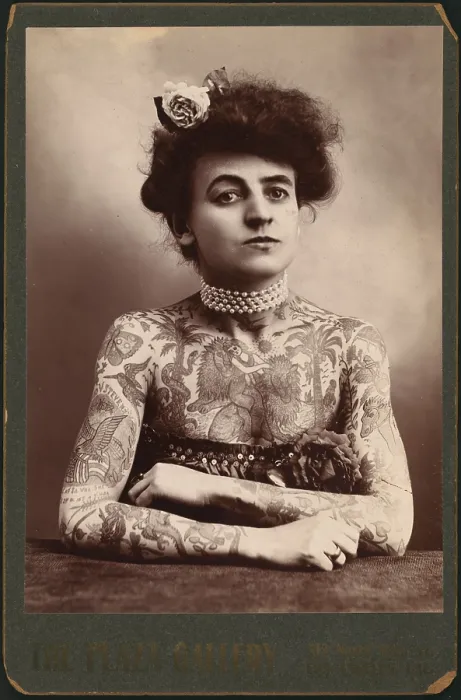 Framed Print : Portrait of a woman showing images tattooed on her body, the Plaza Gallery, Los Angeles, California, 1907