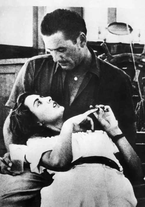 Framed Print : A possibly doctored photo reportedly showing 16 year old Danielle Darvin lying in the lap of actor Errol Flynn, Nice France, 1949. Courtesy of CSU Archives / Everett Collection