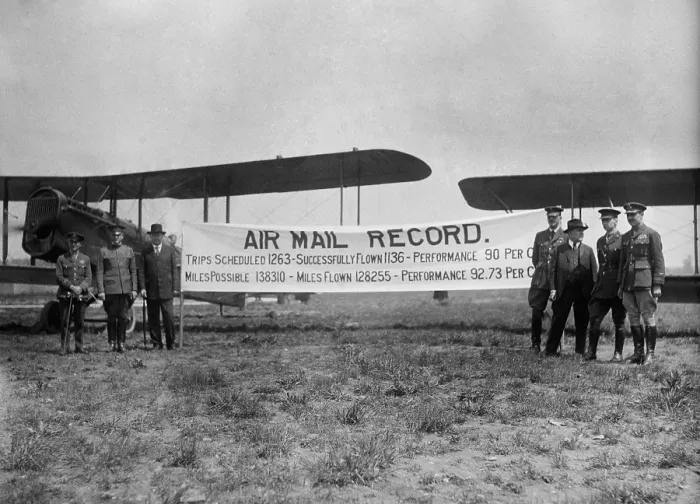 Framed Print : Post Master General Albert S. Burleson with officers from the Army-Air Force commemorate the first year of Air Mail in the United States. May 19 1919. LC-DIG-npcc-18659
