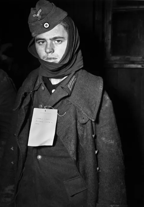 Framed Print : POW captured near Ubach, Germany, wears a tag indicating he has an sprained back. Dec. 1, 1944 during World War 2. (BSLOC_2013_14_290) Framed Print : POW captured near Ubach, Germany, wears a tag indicating he has an sprained back. Dec. 1, 1944 during World War 2. (BSLOC_2013_14_290)