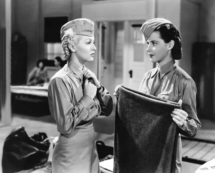 Framed Print : KEEP YOUR POWDER DRY, from left: Lana Turner, Susan Peters, 1945