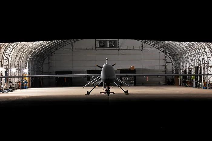 Framed Print : Predator drone an unmanned aircraft can remain in flight for 24 hours and conduct surveillance and missile attacks while remotely guided by human operators in a distant location