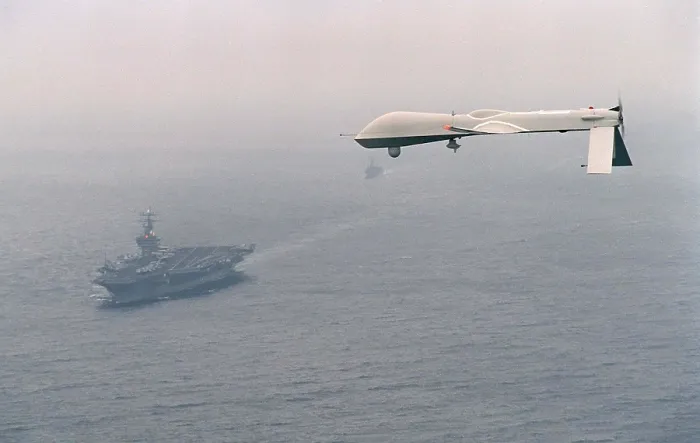 Framed Print : Predator Unmanned Aerial Vehicle flies above the aircraft carrier USS Carl Vinson on a Navy aerial reconnaissance test flight off the coast of California. Dec. 5 1995 Framed Print : Predator Unmanned Aerial Vehicle flies above the aircraft carrier USS Carl Vinson on a Navy aerial reconnaissance test flight off the coast of California. Dec. 5 1995