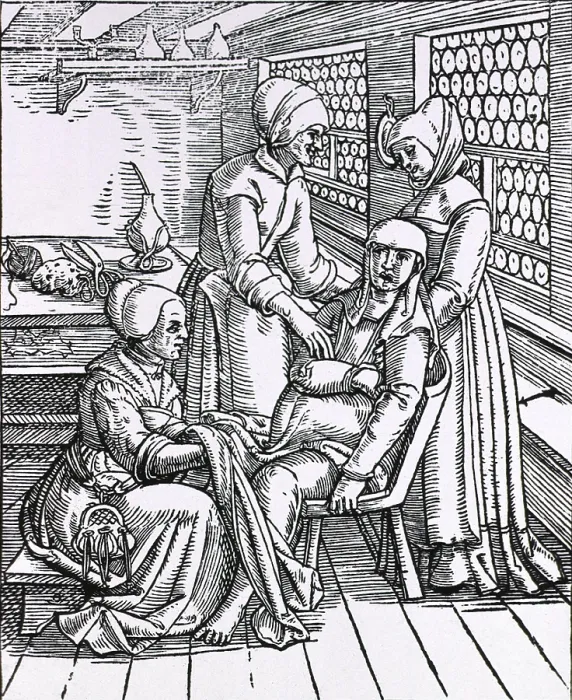 Framed Print : A pregnant woman sitting in a birthing chair is being attended to by three midwives, one ready to receive the baby, the second standing behind the chair Framed Print : A pregnant woman sitting in a birthing chair is being attended to by three midwives, one ready to receive the baby, the second standing behind the chair