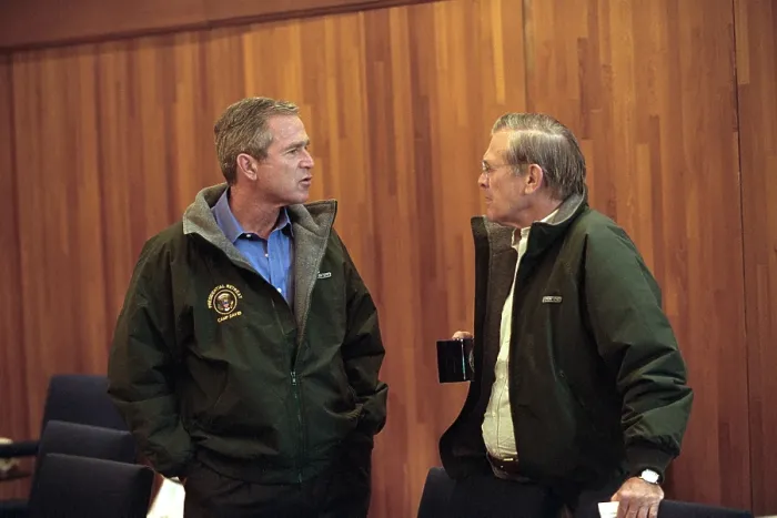 Framed Print : Pres. George W. Bush with Sec. of Defense Donald Rumsfeld, Sept. 15, 2001. They are on a break during a National Security Council meeting at Camp David in Thurmont, Maryland