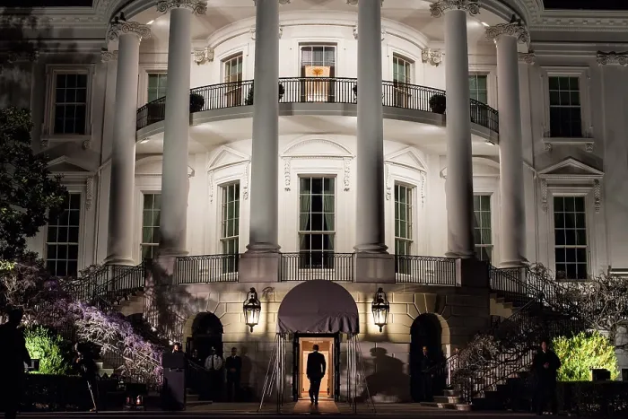 Framed Print : President Barack Obama enters the South Portico of the White House at night on March 30, 2012. (BSLOC_2015_13_131)