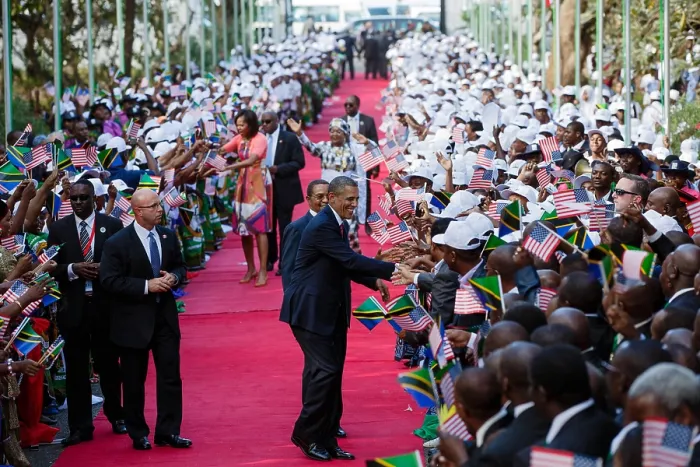 Framed Print : President Barack Obama and First Lady Michelle Obama shake hands with the Tanzanian crowd