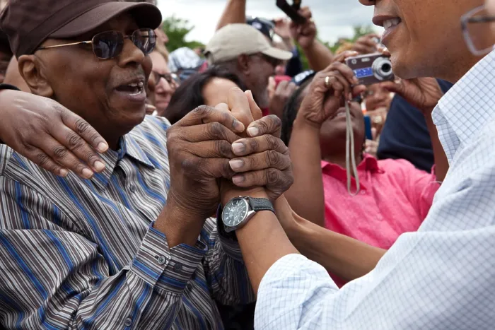 Framed Print : President Barack Obama with greets a man in Detroit during a Labor Day celebration. Sept. 5, 2011 (BSLOC_2015_3_86)