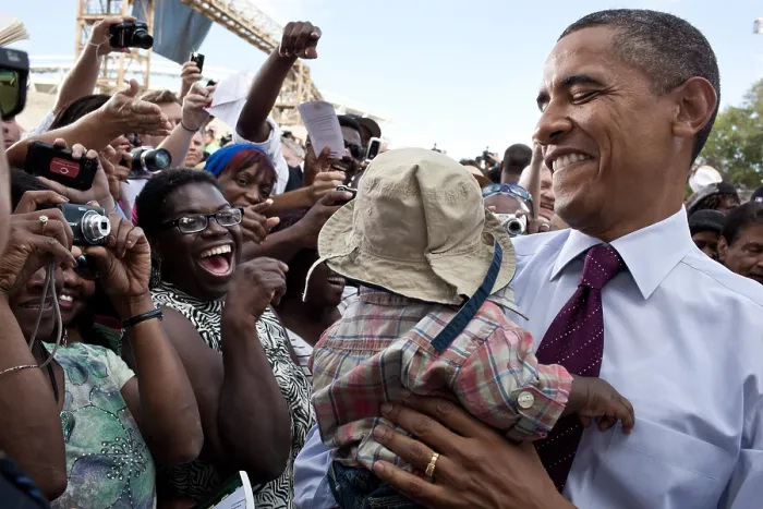 Framed Print : President Barack Obama holds a baby after delivering speaking in Cincinnati, Ohio. Sept. 22, 2011. (BSLOC_2015_3_88)