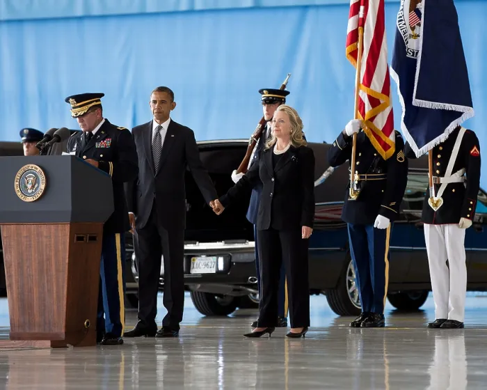 Framed Print : President Barack Obama holds hands with Sec. of State Hillary Rodham Clinton at Andrews Field, MD. On Sept
