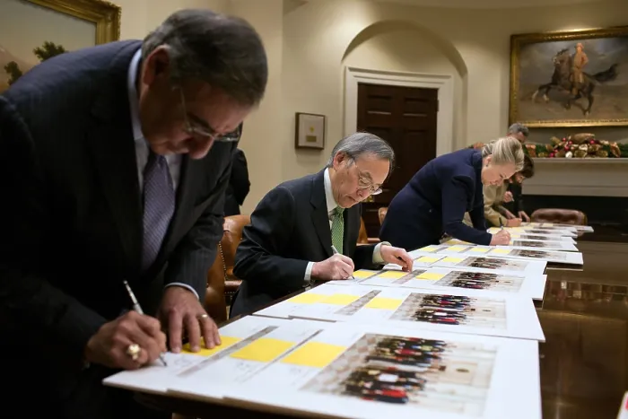 Framed Print : President Barack Obama meets with Treasury Sec. Timothy Geithner in the Oval Office. Aug. 5, 2011. In the background is National Economic Council Director Gene Sperling
