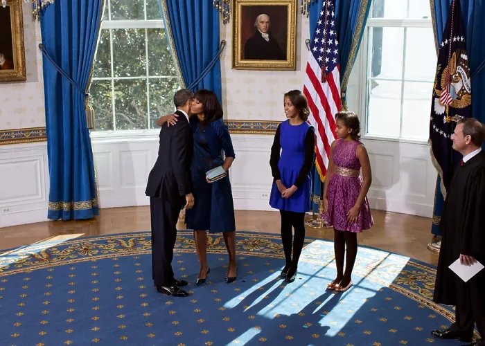 Framed Print : President Barack Obama and Michelle Obama embrace after the official swearing-in ceremony. The ceremony was held on Sunday, Jan