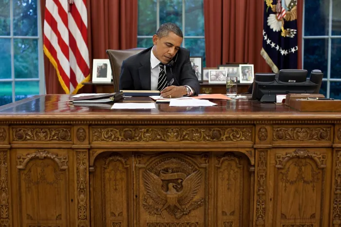 Framed Print : President Barack Obama at his Oval Office desk, Sept. 7, 2011. Obama is talking with Gov. Rick Perry about the unprecedented fires in Texas. (BSLOC_2015_3_2) Framed Print : President Barack Obama at his Oval Office desk, Sept. 7, 2011. Obama is talking with Gov. Rick Perry about the unprecedented fires in Texas. (BSLOC_2015_3_2)