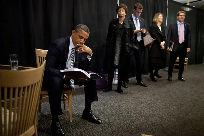 Framed Print : President Barack Obama reviews notes as his staff waits before an event in Denver, Colorado. Oct. 25, 2011. L-R: The President, Valerie Jarret, unidentified, Nick Pappas, Asst Framed Print : President Barack Obama reviews notes as his staff waits before an event in Denver, Colorado. Oct. 25, 2011. L-R: The President, Valerie Jarret, unidentified, Nick Pappas, Asst