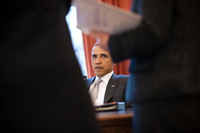 Framed Print : President Barack Obama talks with advisors in the Oval Office, April 4, 2011. (BSLOC_2015_3_4)