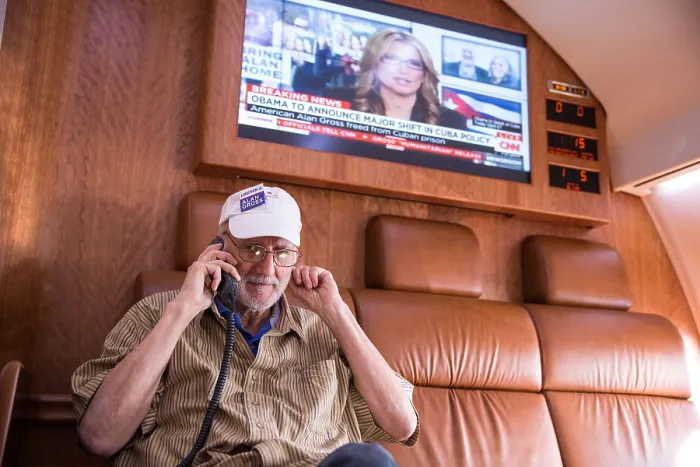 Framed Print : President Barack Obama talks on the phone with Alan Gross after his release from a Cuban prison Framed Print : President Barack Obama talks on the phone with Alan Gross after his release from a Cuban prison