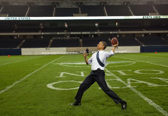 Framed Print : President Barack Obama throws a football at Soldier Field. Chicago, Illinois, May 20, 2012. (BSLOC_2015_3_12)