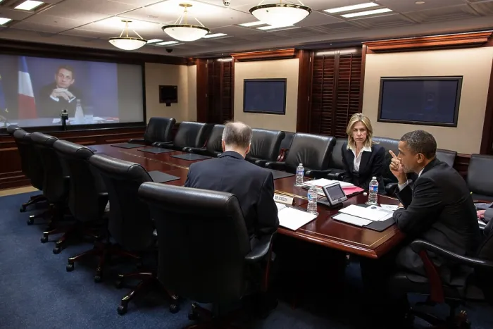Framed Print : President Barack Obama in a video teleconference with President Nicolas Sarkozy of France