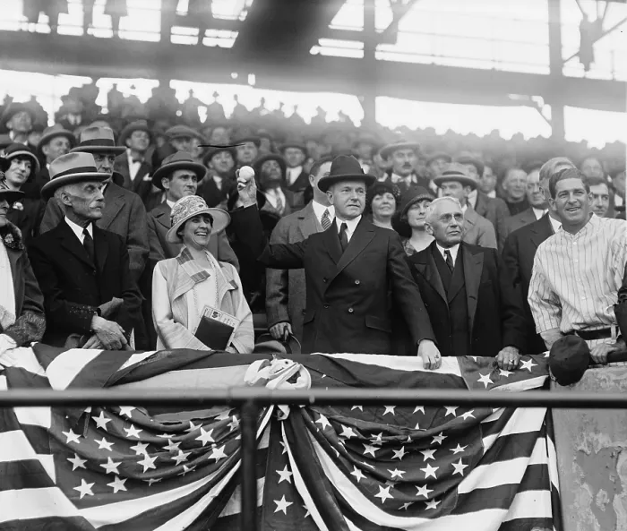 Framed Print : President Calvin Coolidge (1872-33), with wife Grace and Sec. of Treasury Andrew Mellon, opens the Baseball season by throwing out the first ball, Apr. 22, 1924