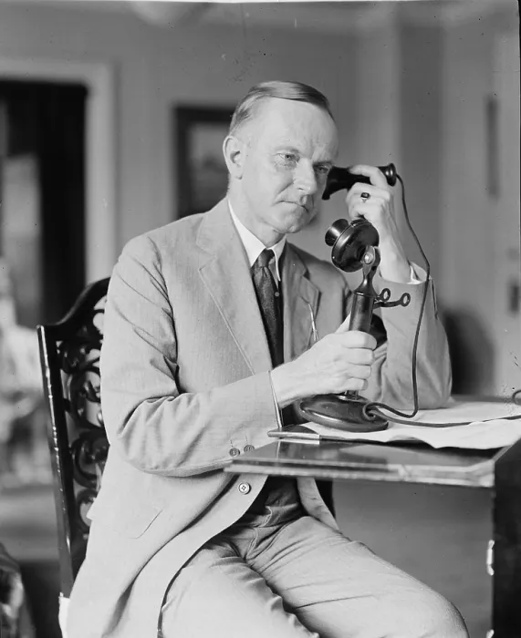 Framed Print : President Calvin Coolidge (1872-33) using a telephone, two days after the sudden death of President Warren Harding on Aug. 2, 1923