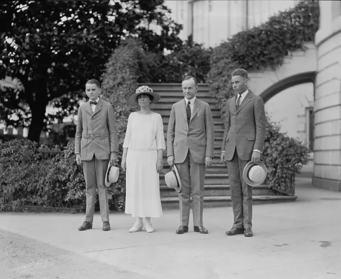 Framed Print : President Calvin Coolidge (1872-33) with his wife and two sons Calvin Jr. (on left) and John, in September 1923. Calvin Jr. would die the following summer Framed Print : President Calvin Coolidge (1872-33) with his wife and two sons Calvin Jr. (on left) and John, in September 1923. Calvin Jr. would die the following summer