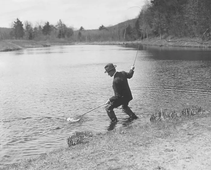 Framed Print : President Calvin Coolidge fishing with a rod and net in a pond. Unknown location. Ca. 1925-28. (CSU_2015_9_781) Framed Print : President Calvin Coolidge fishing with a rod and net in a pond. Unknown location. Ca. 1925-28. (CSU_2015_9_781)