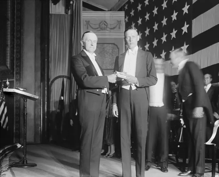 Framed Print : President Calvin Coolidge presents Charles Lindbergh with Congressional Medal of Honor. Nov. 1927. Lindbergh was a Captain in the U.S
