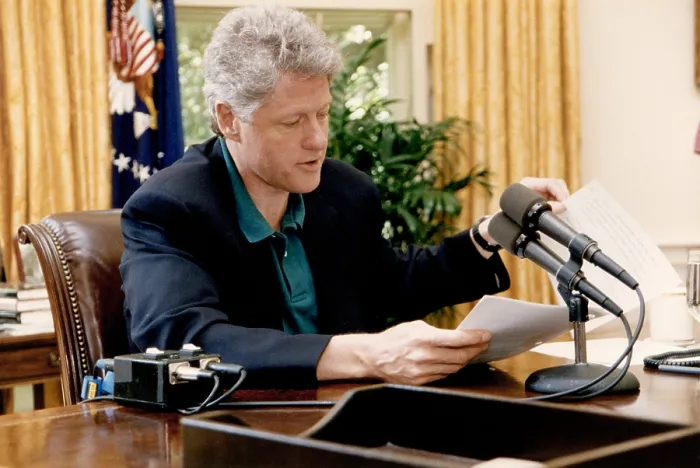 Framed Print : President Bill Clinton delivers his weekly radio address from the White House Oval Office on May 8, 1993