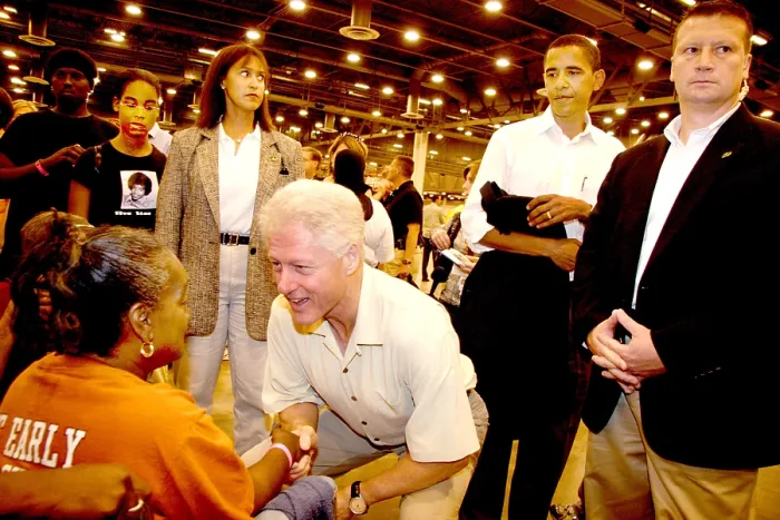 Framed Print : President Bill Clinton greets an Katrina evacuee at the Houston Astrodome. Sept 5, 2005. He and President George H.W