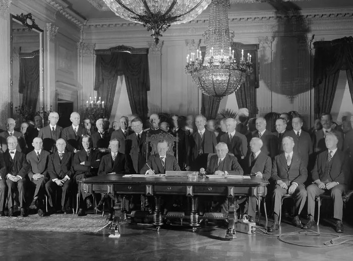 Framed Print : President Coolidge signs Kellogg Treaty in the East Room of the White House on Jan. 17, 1929. Kellogg-Briand Pact was an multi-national agreement to outlaw war Framed Print : President Coolidge signs Kellogg Treaty in the East Room of the White House on Jan. 17, 1929. Kellogg-Briand Pact was an multi-national agreement to outlaw war