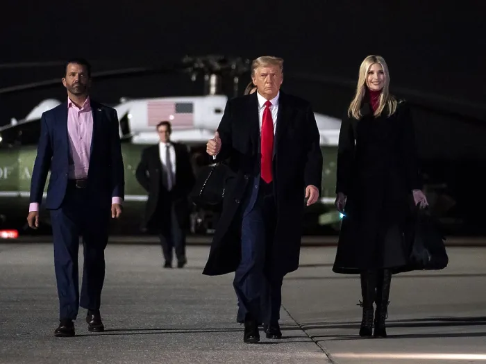 Framed Print : President Donald Trump, with his adult children, Ivanka and Donald Trump Jr. returning from campaigning for Republican Senate candidates in Georgia, Jan