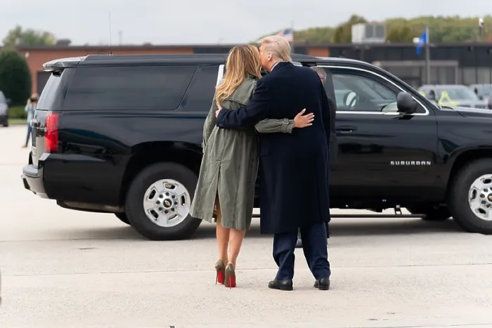Framed Print : President Donald Trump and First Lady Melania Trump embrace as he escorts her to a vehicle at Joint Base Andrews, Oct. 27, 2020